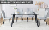 Table and chair set. 1 table and 6 light grey chairs. Glass dining table with 0.31-inch tempered glass tabletop and black coated metal legs. Equipped with light grey PU chairs 1123 008