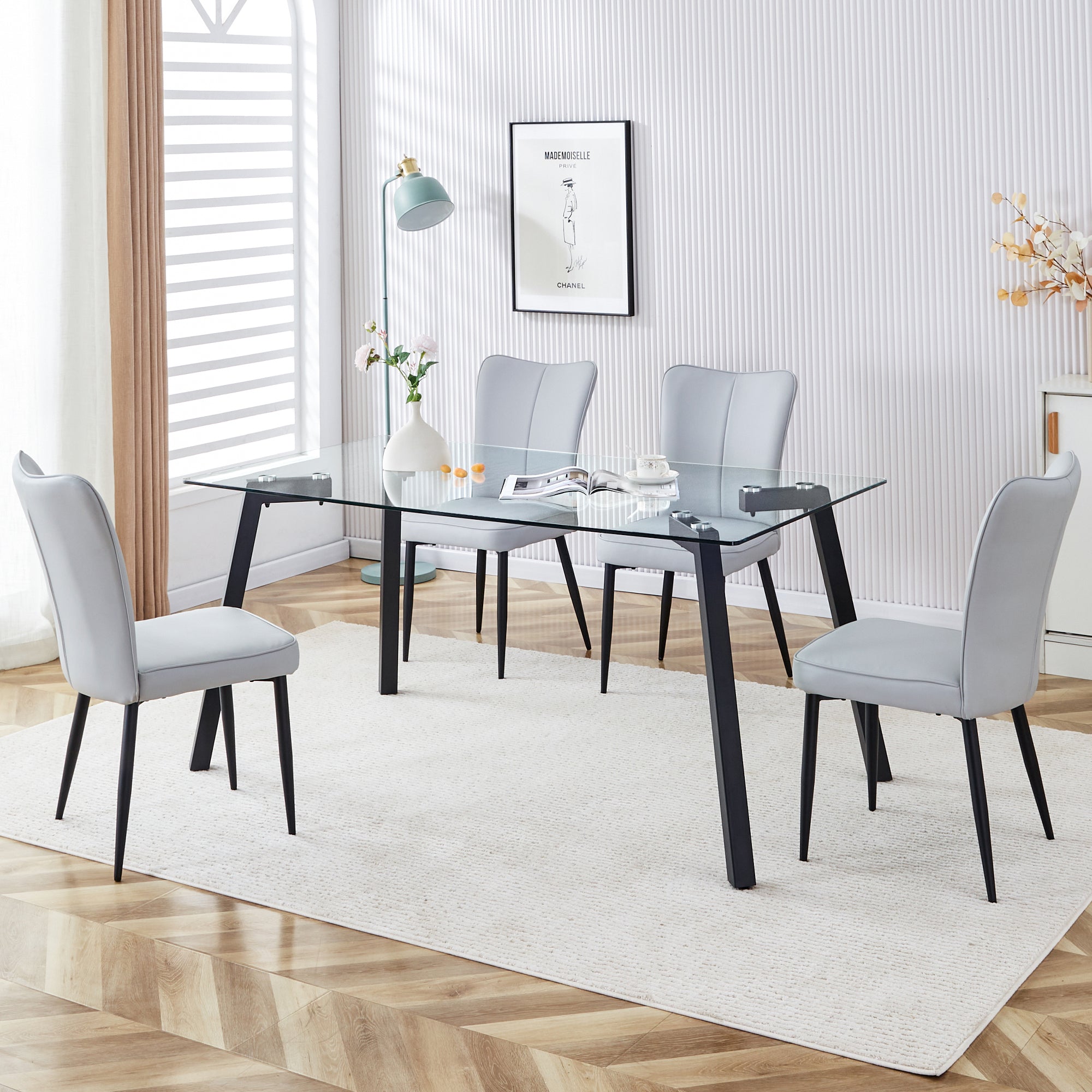 Table and chair set. 1 table and 6 light grey chairs. Glass dining table with 0.31-inch tempered glass tabletop and black coated metal legs. Equipped with light grey PU chairs 1123 008