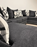 BLACK FABRIC DOUBLE CHAISE SECTIONAL WITH NAILHEADS